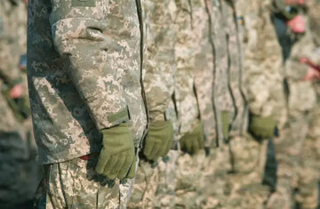 Soldiers wearing uniforms in Universal Camouflage Pattern (UCP).