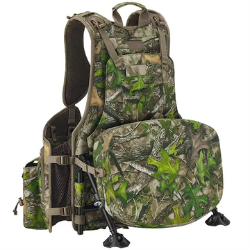 Tactical hunting vest with Mossy Oak camouflage, mesh back panel, adjustable straps, and integrated shooting rest, designed for upland bird hunting.
