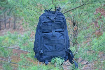 one large black tactical backpack